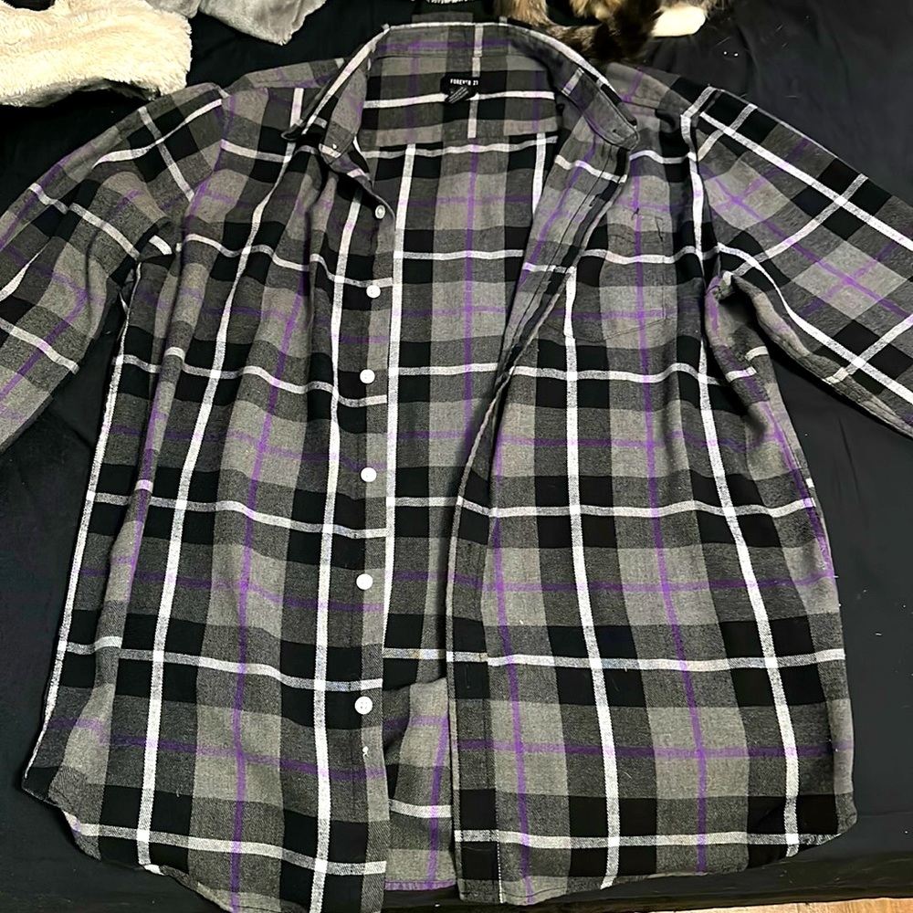Flannel outerwear, wore like twice and it’s just sitting in my closet.